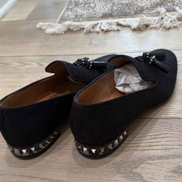 Christian Louboutin Black Textured Loafers with Tassels